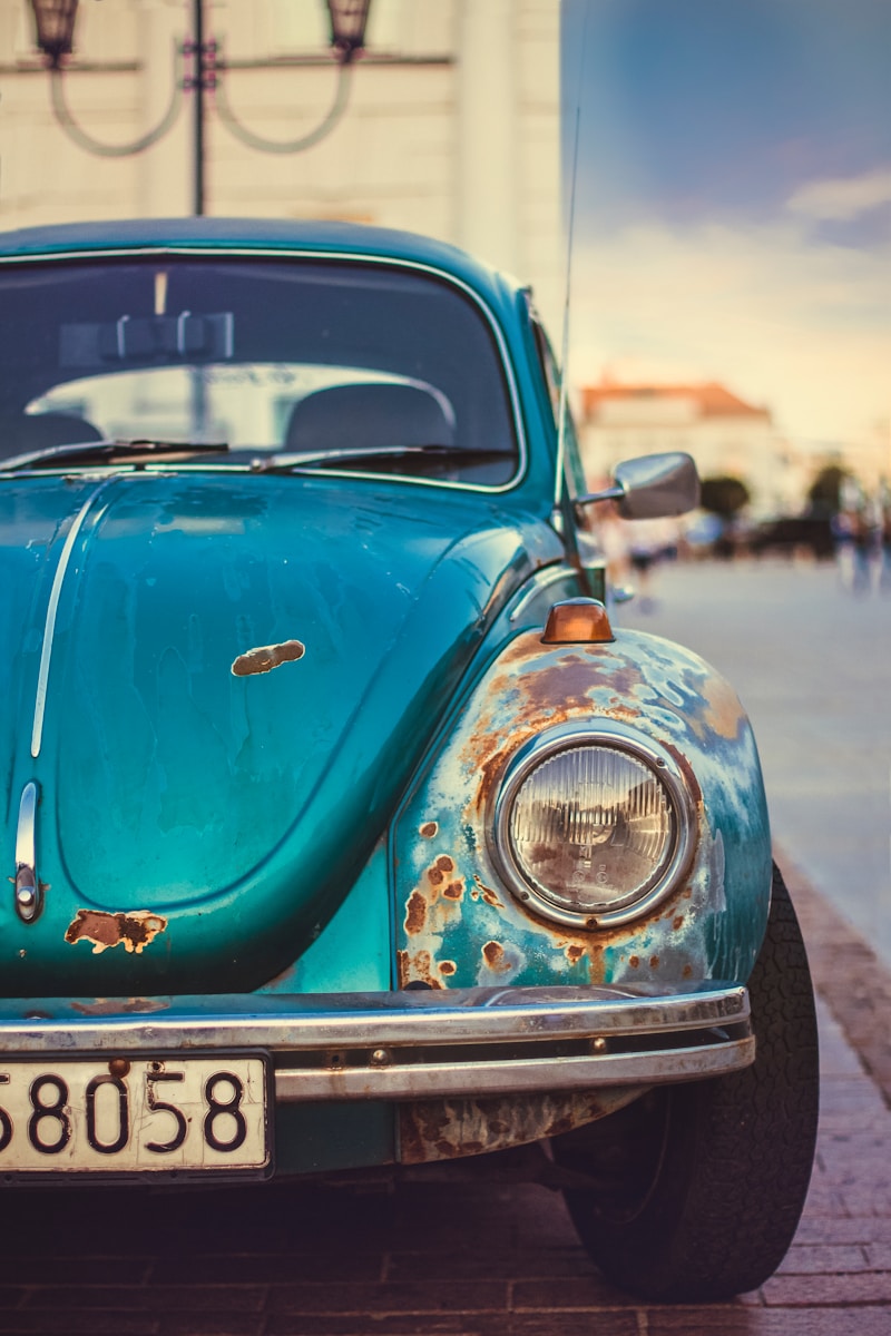 blue Volkswagen Beetle close-up photo